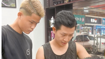 龙华这家理发馆免费为环卫工人、社区老人剪发
